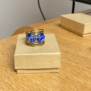 Gold wire ring with blue stones